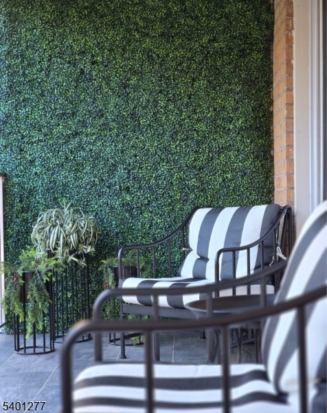 2350 State Route 10, Unit 20 Morris Plains, NJ 07950 - Photo 3 of 13 a view of a chairs and table in the balcony
