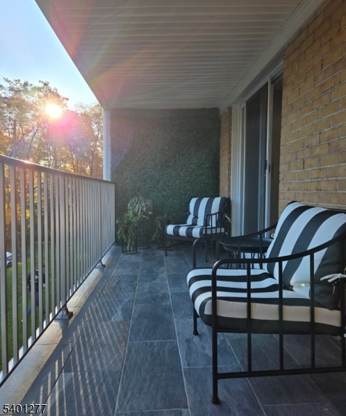 2350 State Route 10, Unit 20 Morris Plains, NJ 07950 - Photo 4 of 13 a view of balcony with furniture