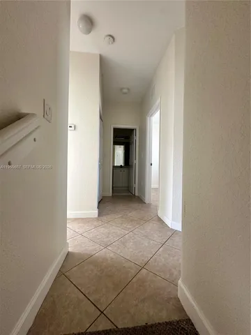 a bathroom with a toilet a sink and bathtub