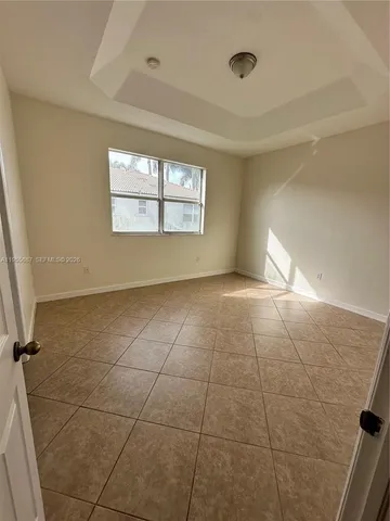a view of a bathroom from a hallway