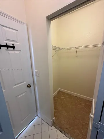 a view of a park with palm trees