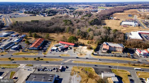 an aerial view of residential house with parking space