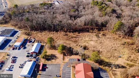 a view of swimming pool with a yard