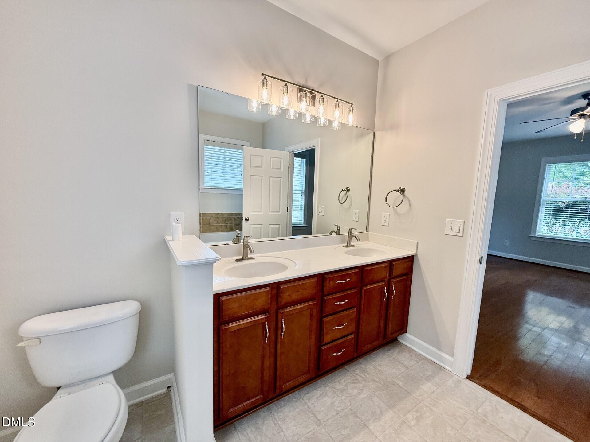 3837 Cumberland Pond Road Raleigh, NC 27606 - Photo 30 of 44 3837 double vanity primary down