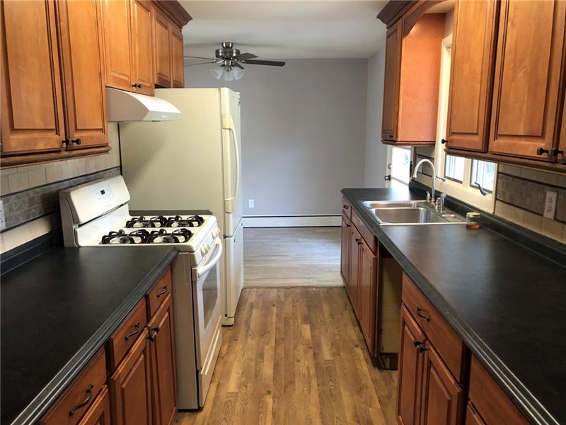 16 Ridgewood Way New Castle, PA 16105 - Photo 2 of 20 Kitchen with new counters and flooring.