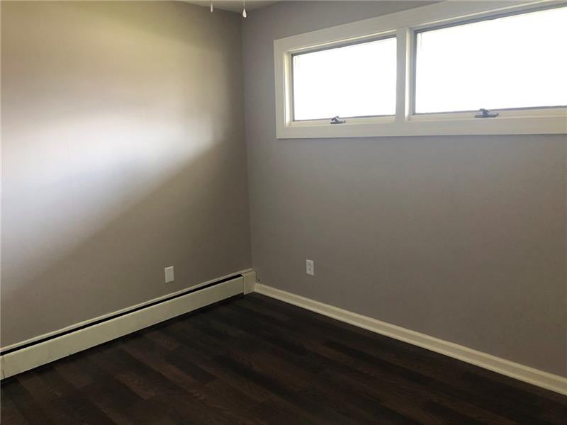 16 Ridgewood Way New Castle, PA 16105 - Photo 17 of 20 Bedroom # 3 with new paint and flooring.