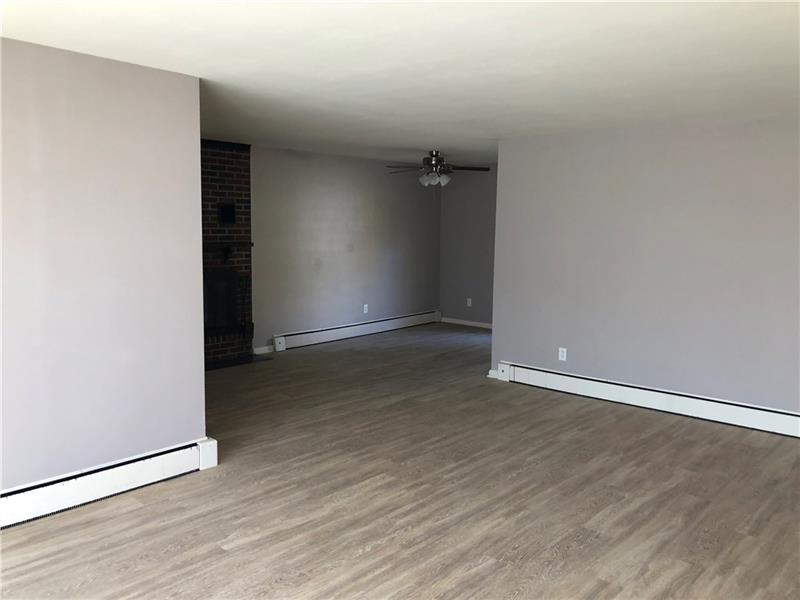 16 Ridgewood Way New Castle, PA 16105 - Photo 6 of 20 View from front door as you enter. Living room looking into Dining Room.