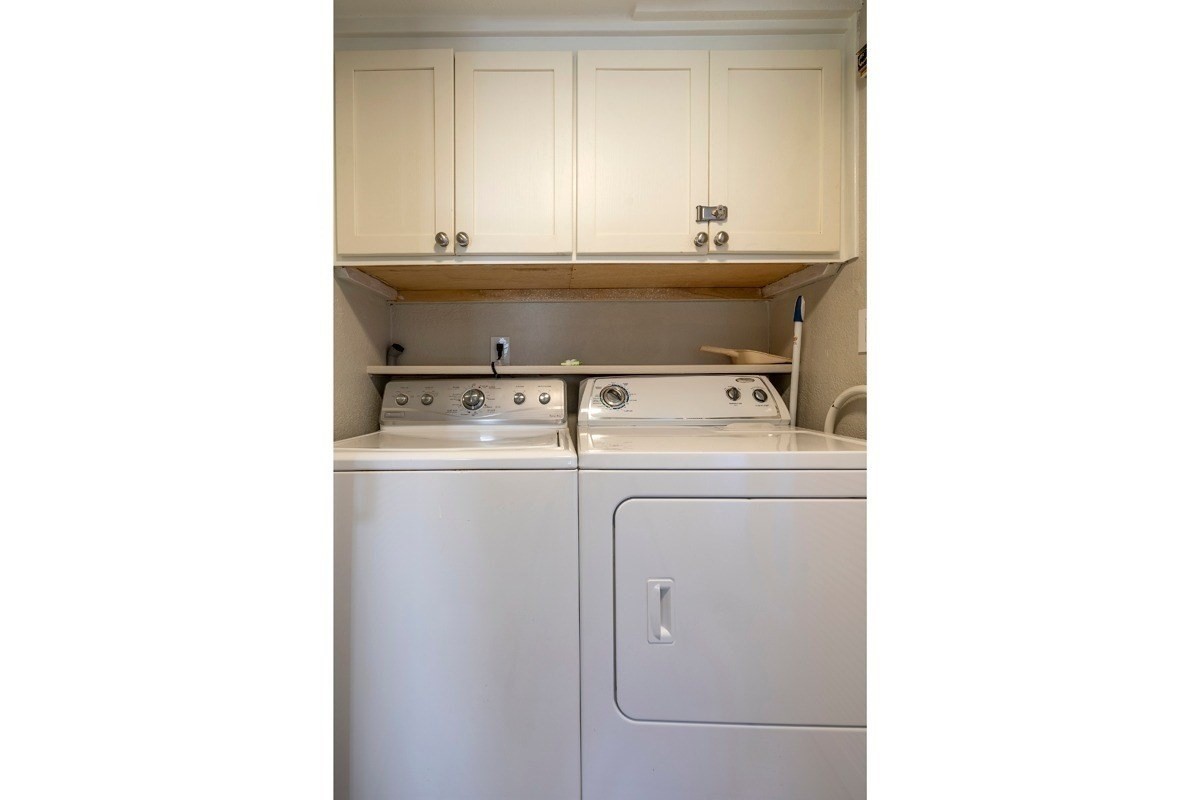 1661 Pee Road, Unit I202 Koloa, HI 96756 - Photo 11 of 11 a utility room with dryer and washer