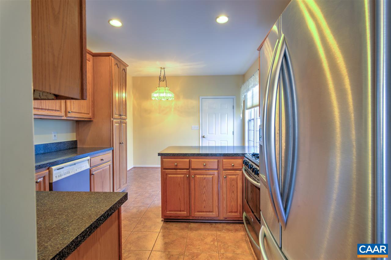 32 Zephyr Road Palmyra, VA 22963 - Photo 13 of 31 a kitchen with stainless steel appliances granite countertop a refrigerator and a stove