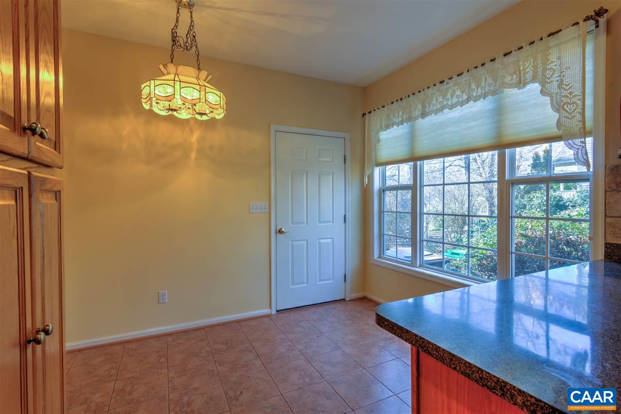 32 Zephyr Road Palmyra, VA 22963 - Photo 14 of 31 a view of a livingroom with furniture wooden floor and window