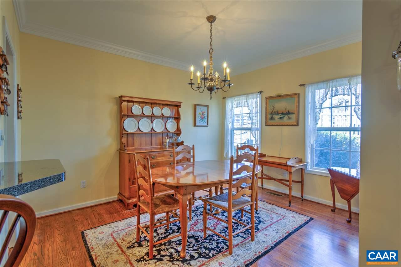 32 Zephyr Road Palmyra, VA 22963 - Photo 15 of 31 a view of a dining room with furniture and wooden floor
