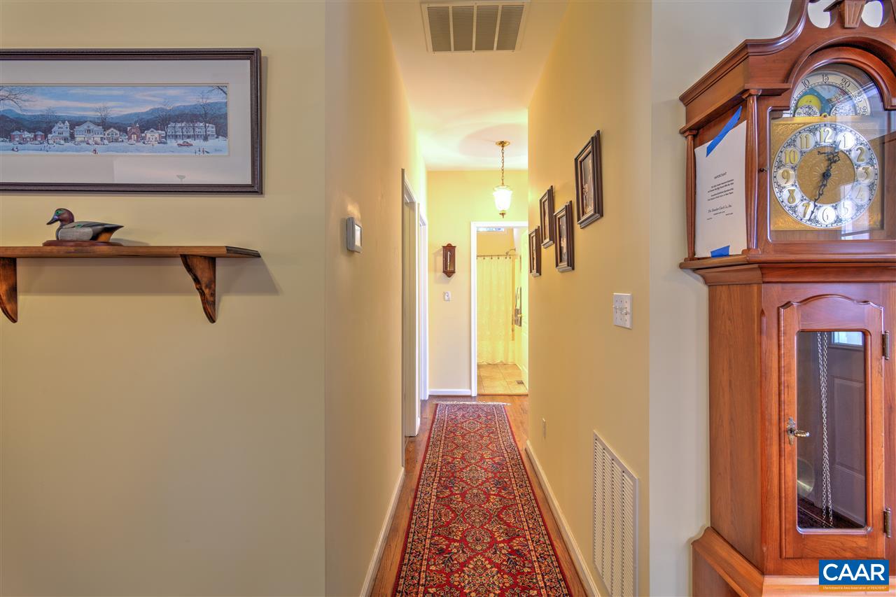 32 Zephyr Road Palmyra, VA 22963 - Photo 18 of 31 a view of a hallway with entryway wooden floor and front door