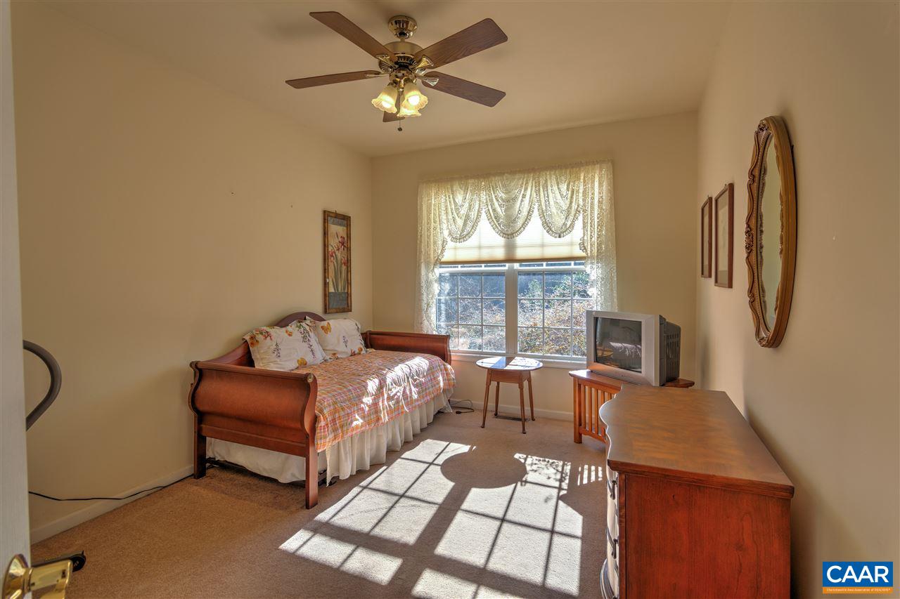 32 Zephyr Road Palmyra, VA 22963 - Photo 26 of 31 a bedroom with furniture and a large window