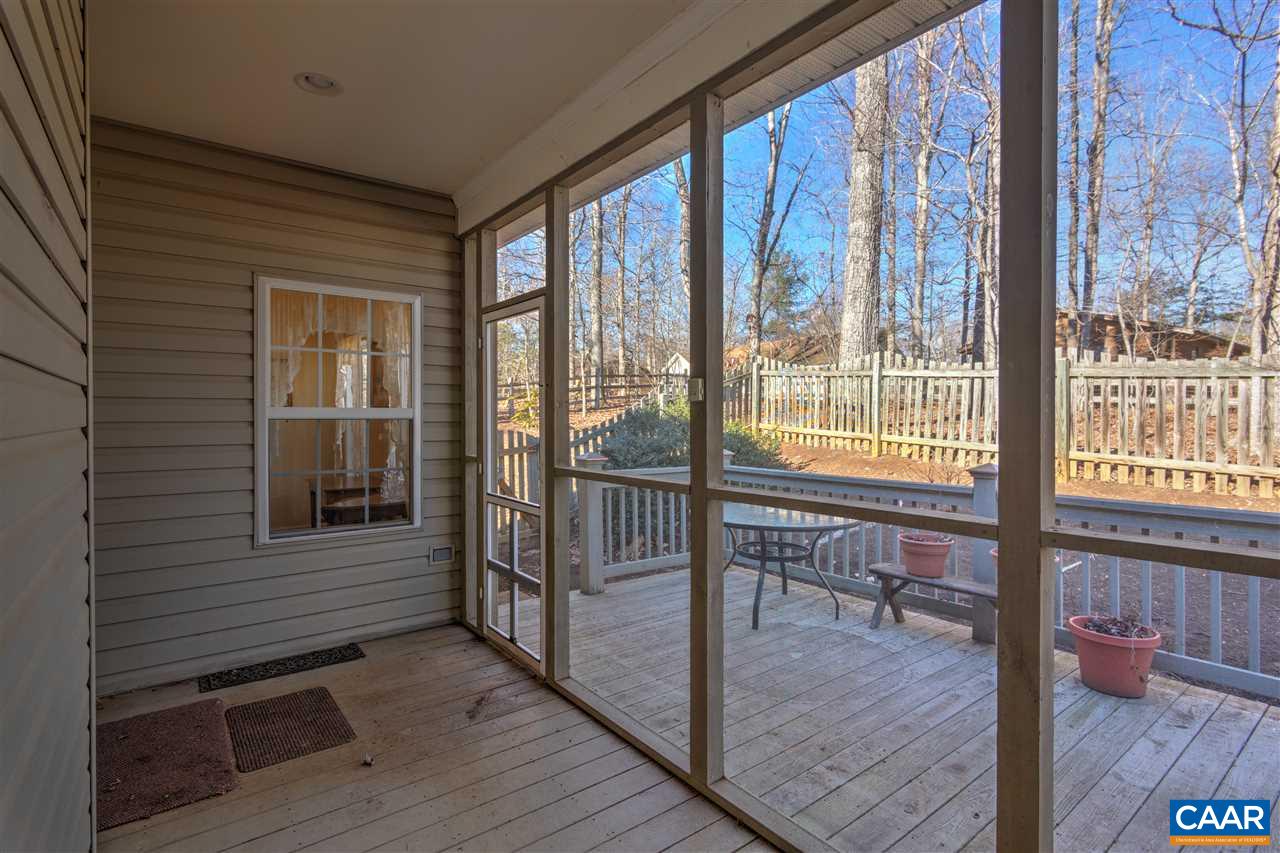 32 Zephyr Road Palmyra, VA 22963 - Photo 30 of 31 a view of a porch with wooden floor and outdoor seating