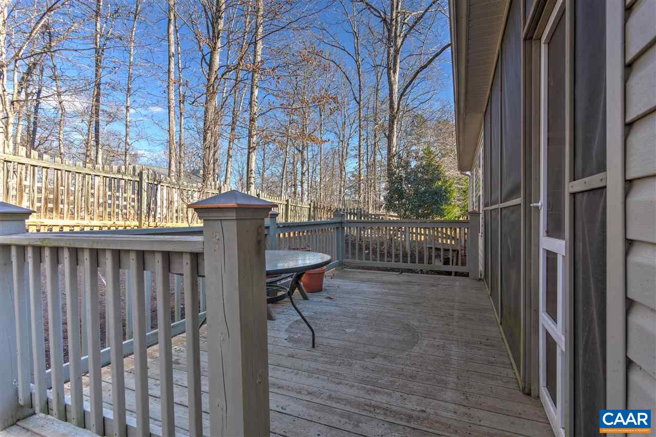 32 Zephyr Road Palmyra, VA 22963 - Photo 31 of 31 a view of a chair and table in backyard of the house