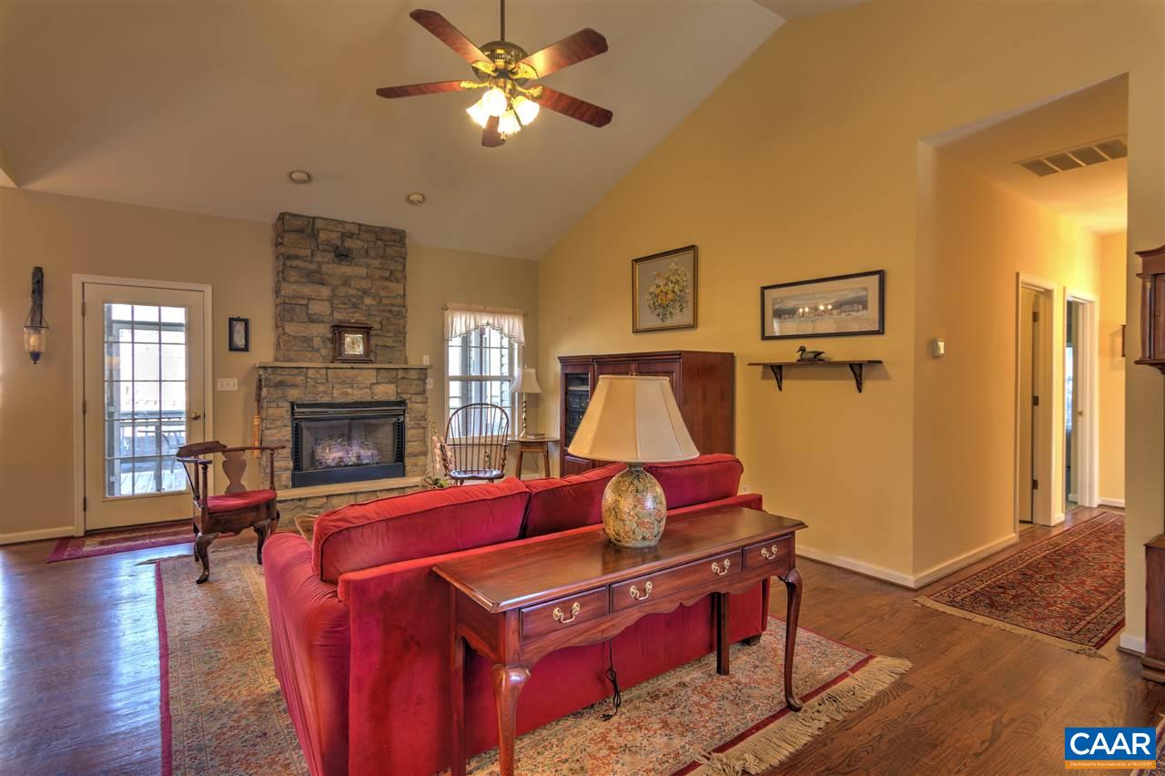 32 Zephyr Road Palmyra, VA 22963 - Photo 4 of 31 a living room with furniture and a fireplace