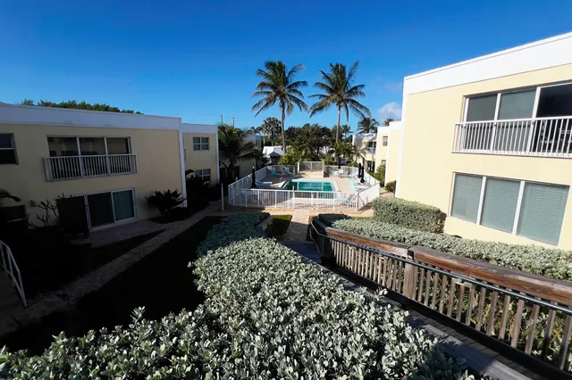 a view of a porch with furniture