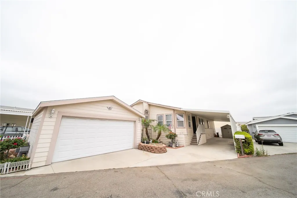 49 Pine Via Anaheim, CA 92802 - Photo 2 of 23 a view of a house with a outdoor space