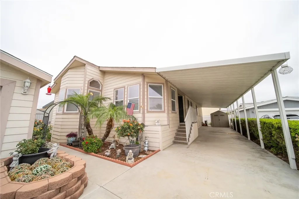 49 Pine Via Anaheim, CA 92802 - Photo 3 of 23 a view of a house with potted plants