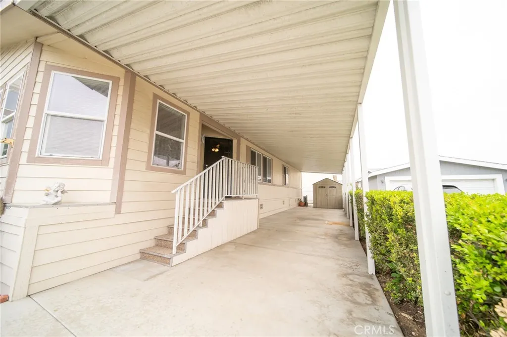 49 Pine Via Anaheim, CA 92802 - Photo 5 of 23 a view of a house with a balcony