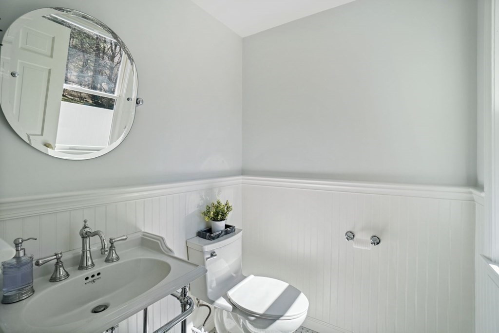 89 Plain Road Wayland, MA 01778 - Photo 12 of 30 a bathroom with a sink and a mirror