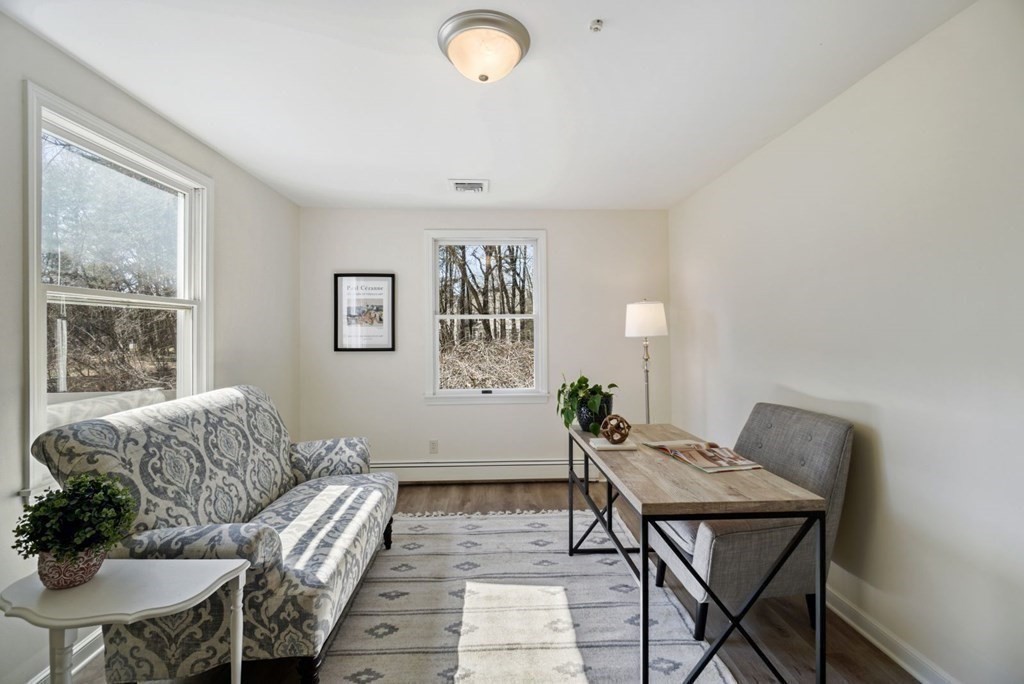 89 Plain Road Wayland, MA 01778 - Photo 14 of 30 a living room with furniture and a window