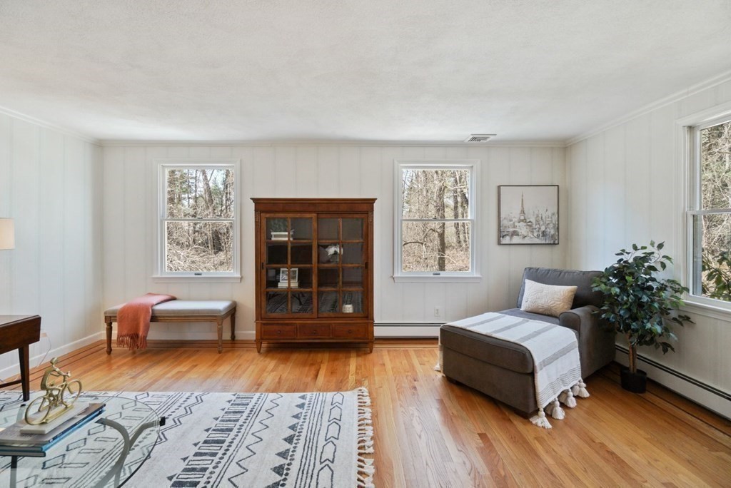 89 Plain Road Wayland, MA 01778 - Photo 17 of 30 a bedroom with a bed and furniture