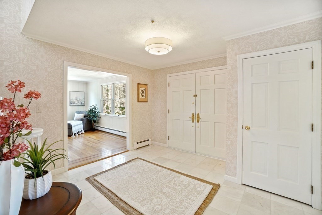 89 Plain Road Wayland, MA 01778 - Photo 2 of 30 a living room with furniture and potted plant
