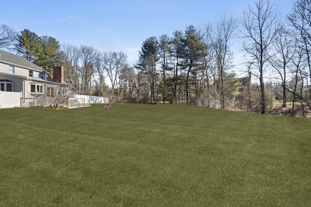 89 Plain Road Wayland, MA 01778 - Photo 30 of 30 a view of a field with trees in the background