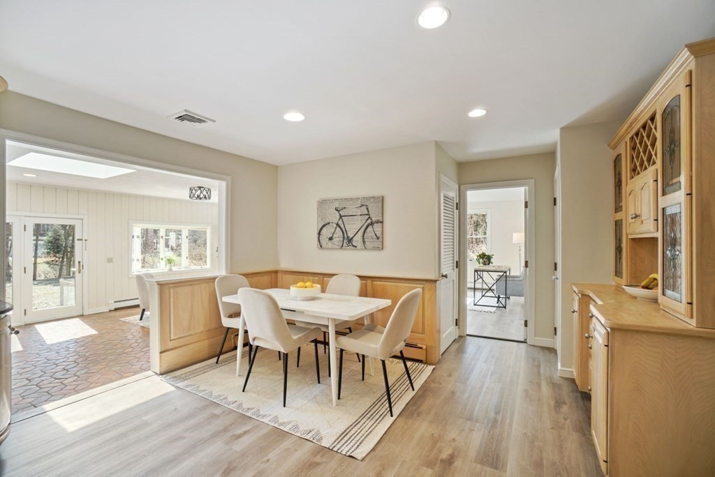 89 Plain Road Wayland, MA 01778 - Photo 6 of 30 a view of a dining room with furniture window and wooden floor