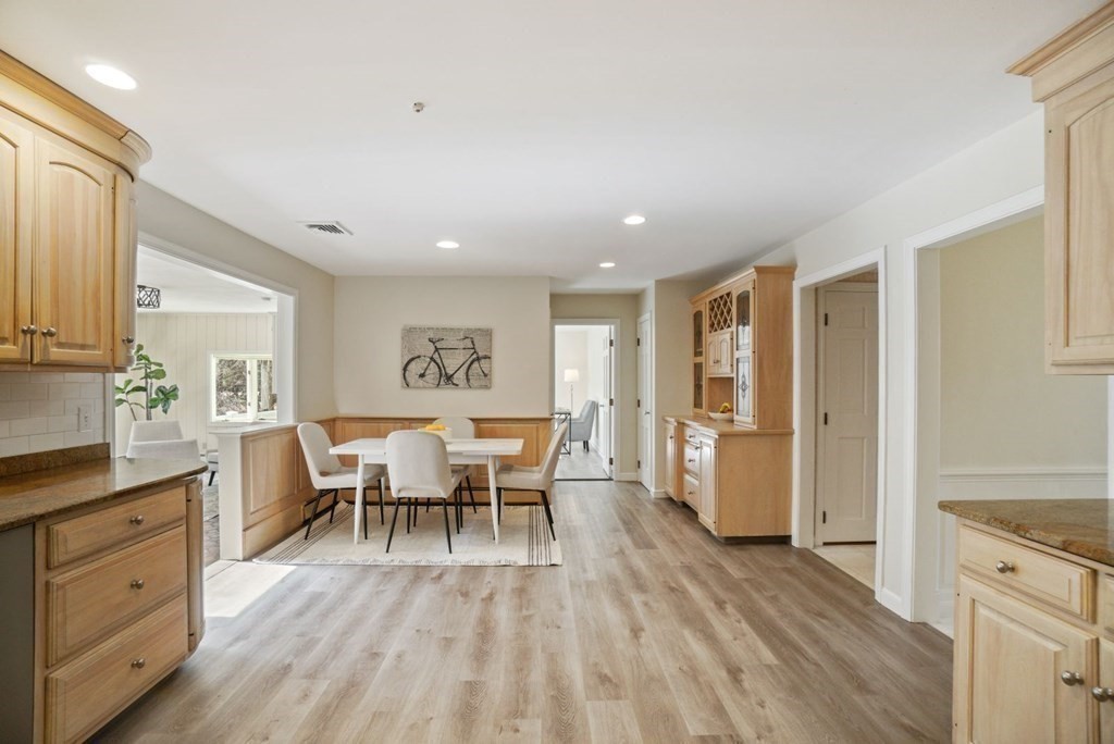89 Plain Road Wayland, MA 01778 - Photo 7 of 30 a view of a dining room with furniture window and wooden floor