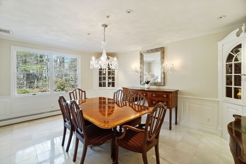 89 Plain Road Wayland, MA 01778 - Photo 8 of 30 a view of a dining room with furniture window and outside view