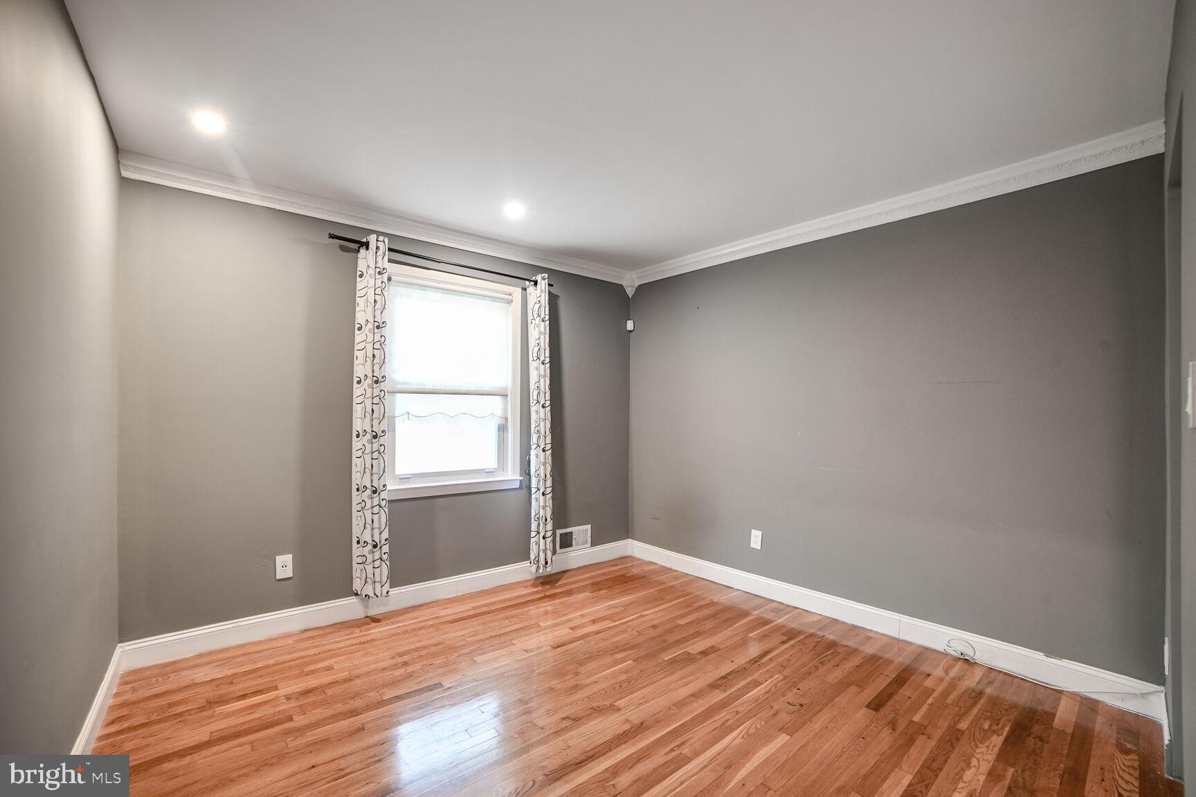 716 Downs Drive Silver Spring, MD 20904 - Photo 18 of 33 a view of empty room with wooden floor