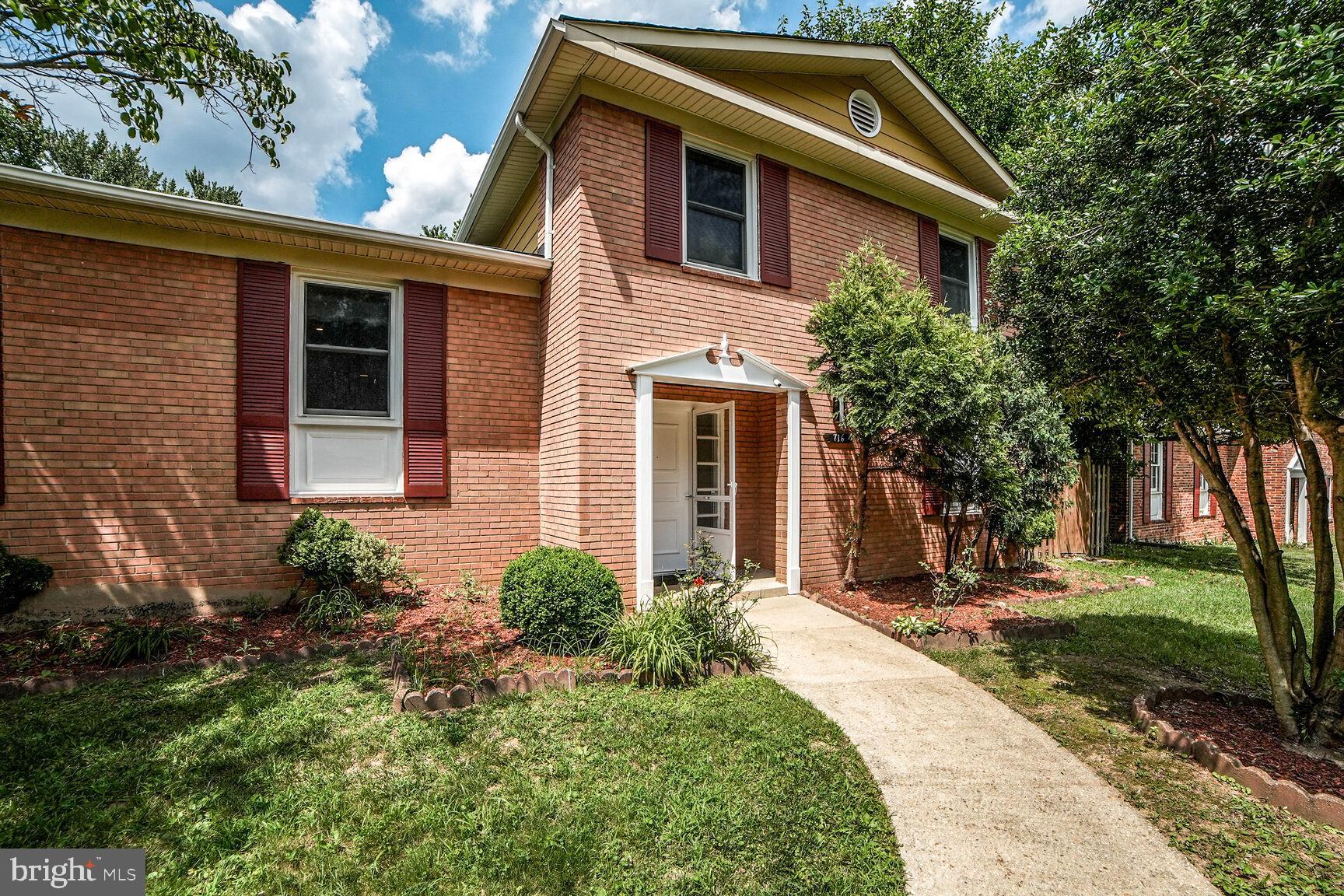 716 Downs Drive Silver Spring, MD 20904 - Photo 2 of 33 a front view of a house with a yard