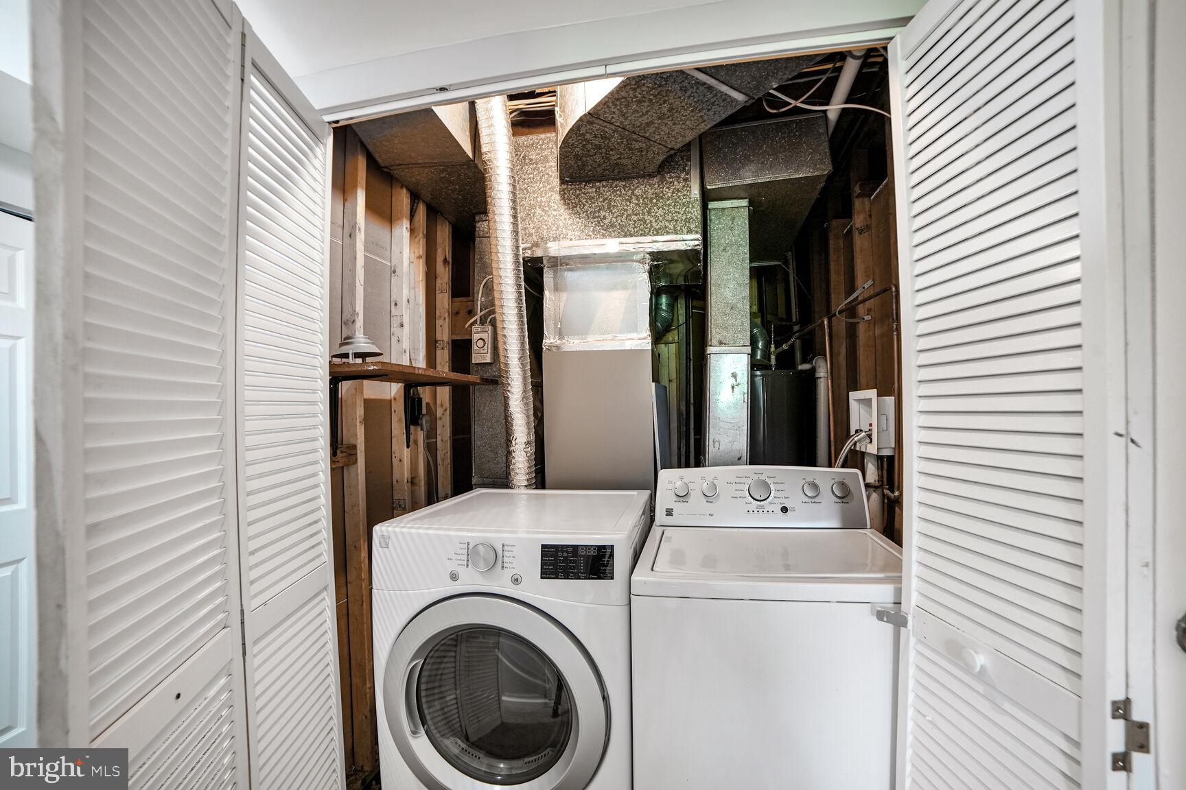 716 Downs Drive Silver Spring, MD 20904 - Photo 26 of 33 a utility room with dryer and washer