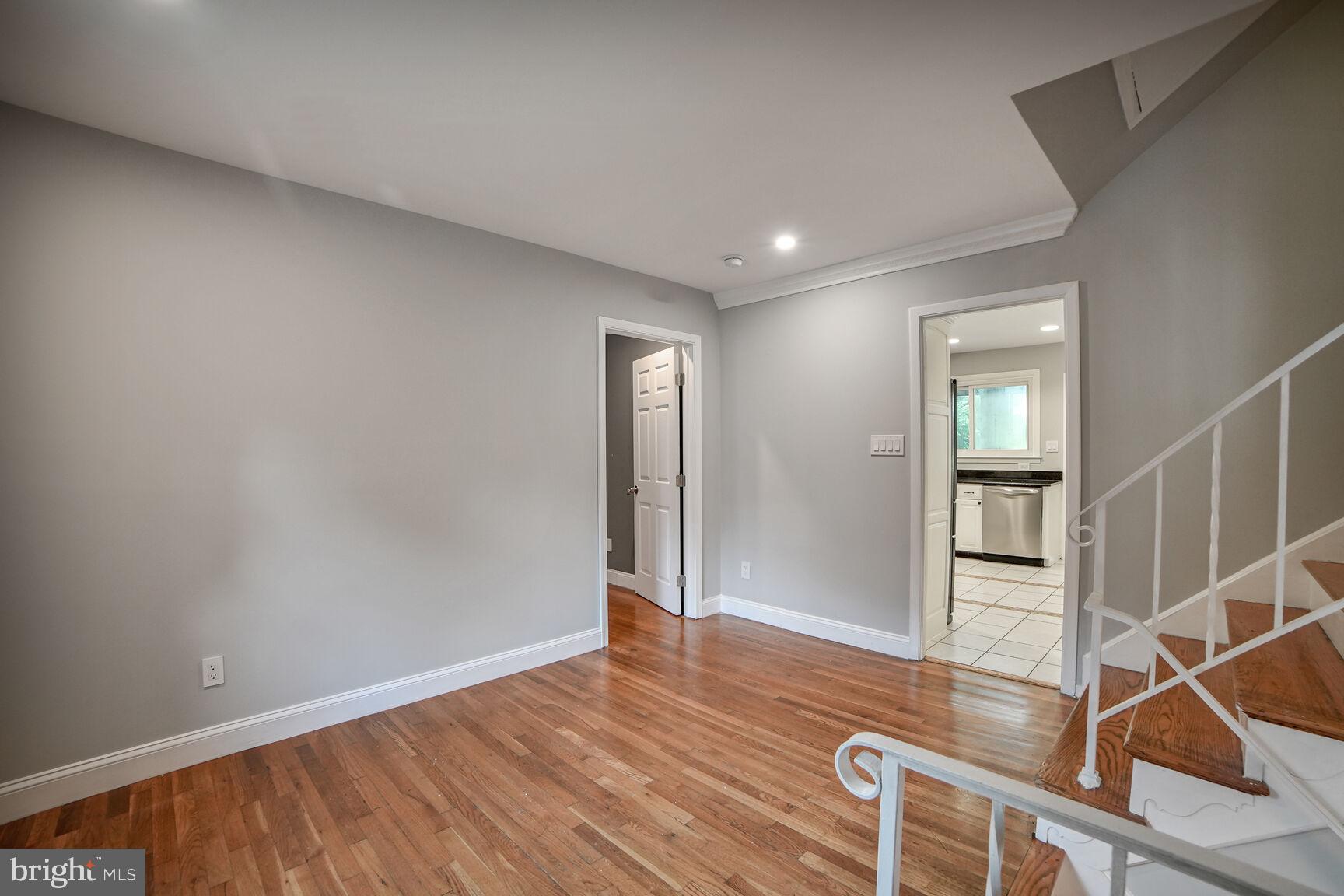716 Downs Drive Silver Spring, MD 20904 - Photo 4 of 33 wooden floor and windows in a room