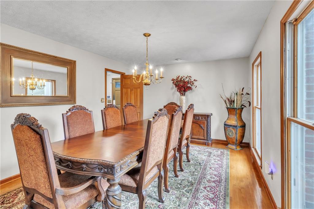 838 Conyers Road McDonough, GA 30252 - Photo 15 of 31 a dining room with furniture and window