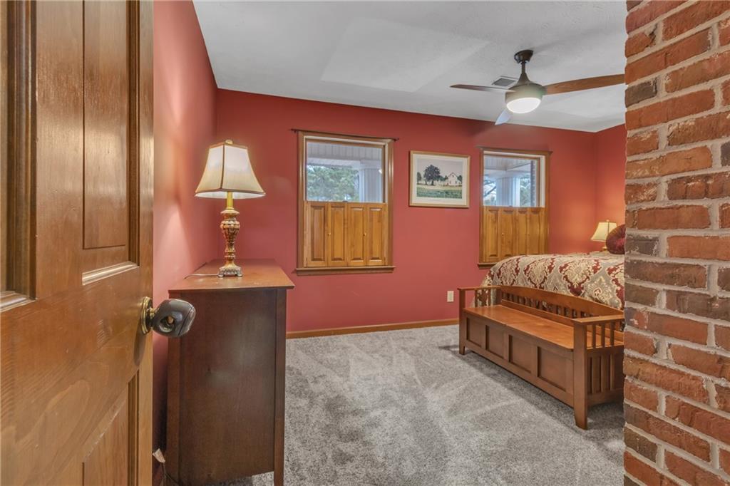 838 Conyers Road McDonough, GA 30252 - Photo 16 of 31 a bedroom with bed and a window