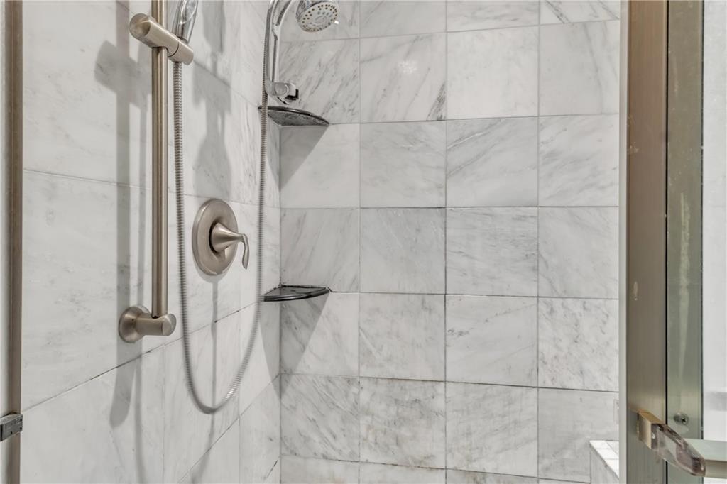 838 Conyers Road McDonough, GA 30252 - Photo 27 of 31 a bathroom with a shower