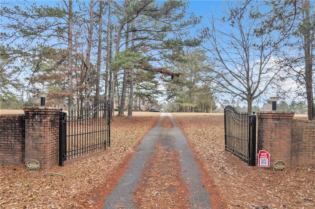 838 Conyers Road McDonough, GA 30252 - Photo 5 of 31 a view of street along with trees