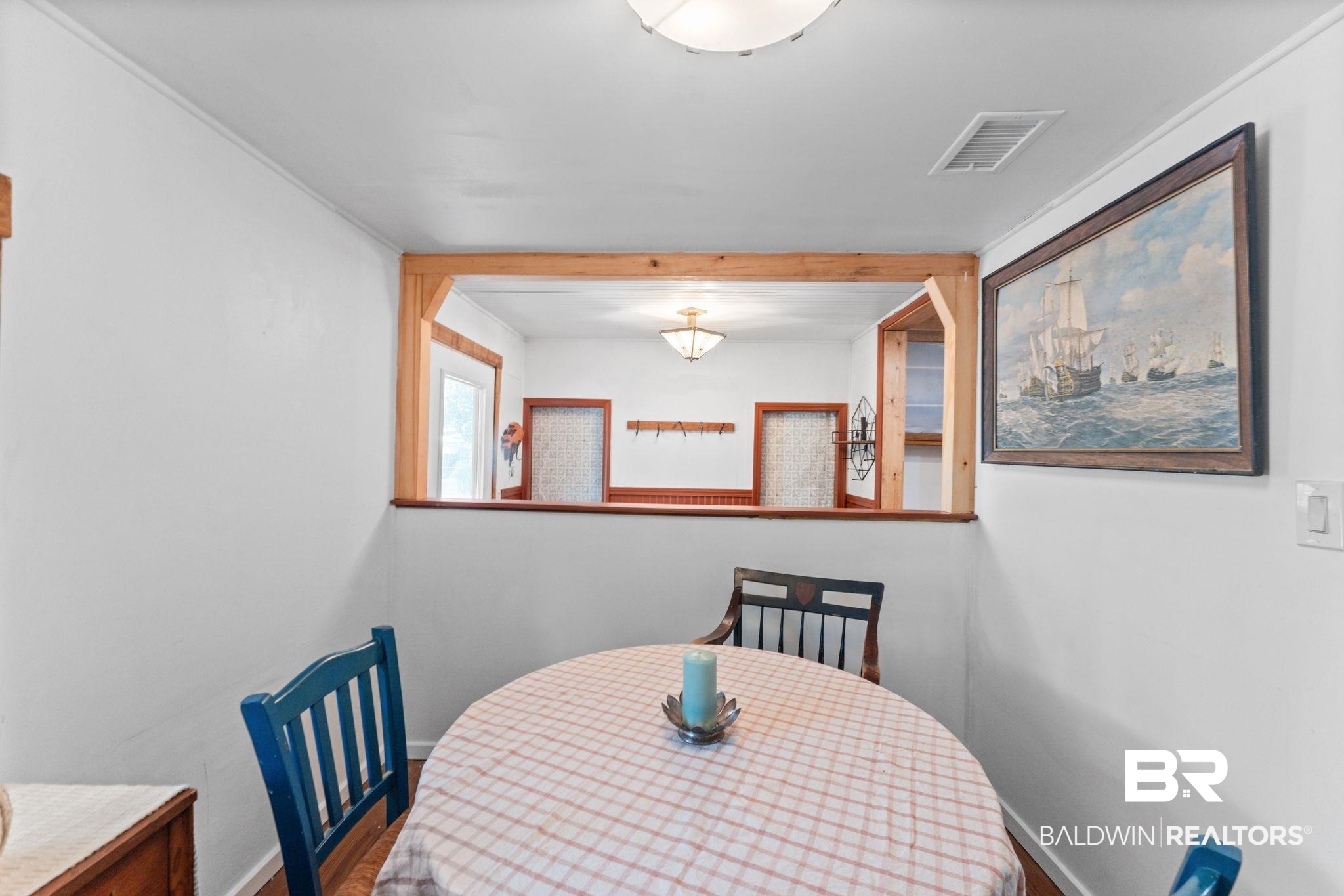10785 Gregg Road Semmes, AL 36575 - Photo 12 of 35 Dining space with wood finished floors and baseboards