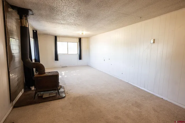 a kitchen with cabinets stainless steel appliances and sink