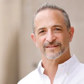 John Giordano, Agent in  - Compass