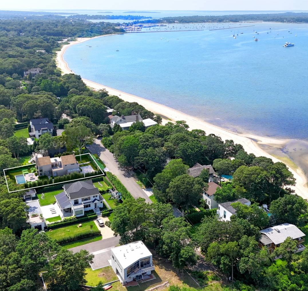 Compass listing. Trees. Beach. Sand. 