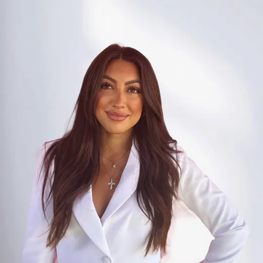 Corina Menagias, Agent in  - Compass