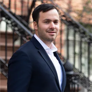 Liam Krausz, Agent in  - Compass