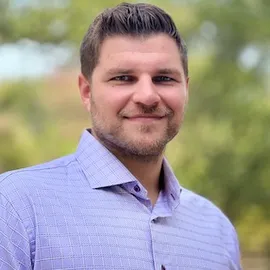 Trevor Heuser, Agent in  - Compass