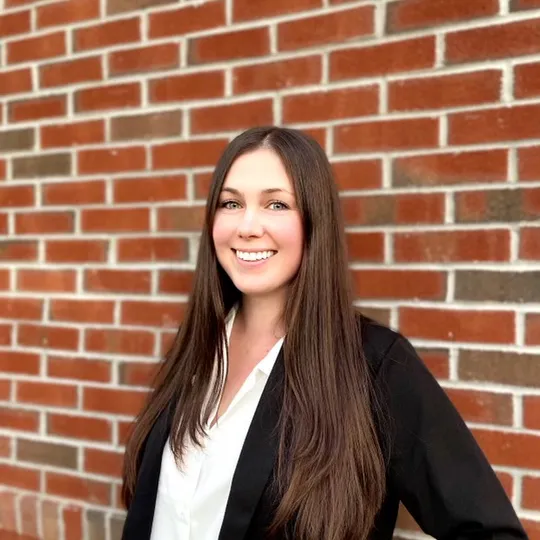 Caitlin McGee, Agent in  - Compass