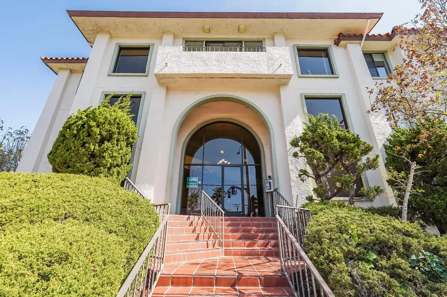 front of building with red staircase