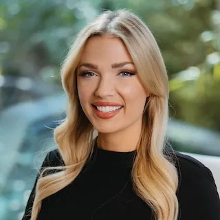 Kaylee Romantic, Agent in  - Compass